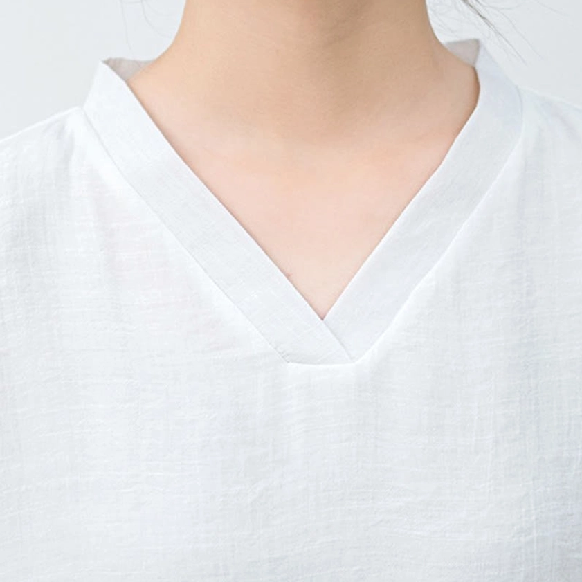 Full-length view of white meditation loungewear ensemble highlighting relaxed silhouette