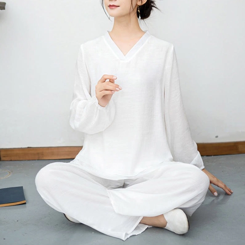 White Tai Chi meditation women's suit fabric close-up showing soft breathable polyester material