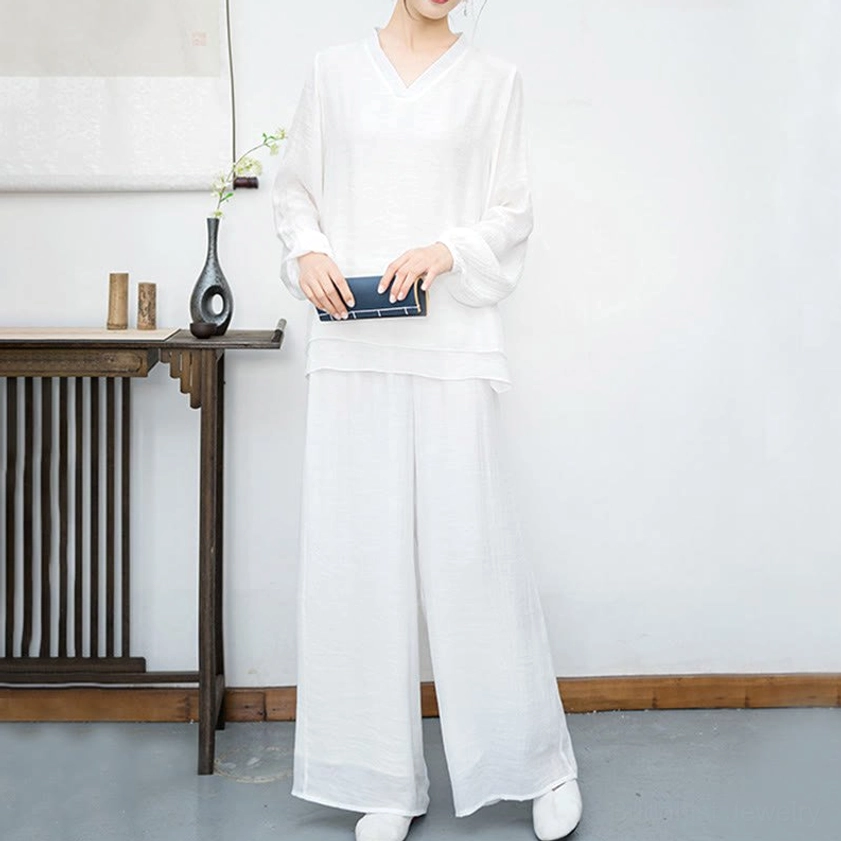 White women's meditation two-piece outfit front full-body view with wide-leg trousers