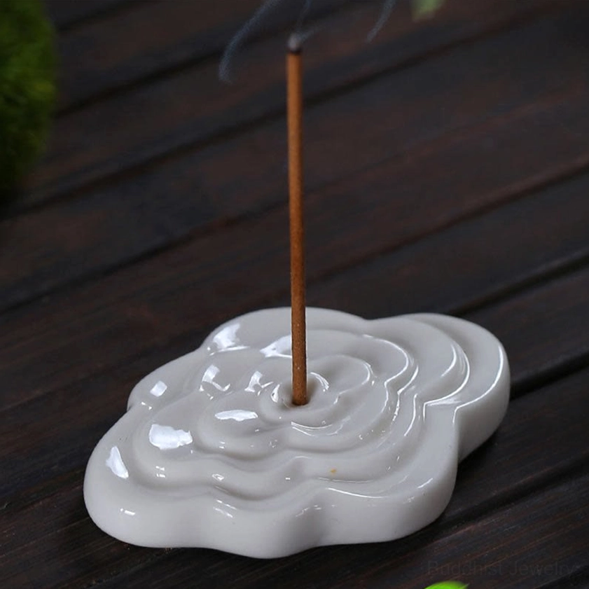 White ceramic rectangular cloud incense burner with 6x4cm dimensions, displaying embossed Buddhist cloud pattern, pristine finish, and minimalist design aesthetic