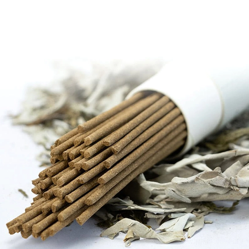 White sage incense sticks in branded packaging tube with white sage label on botanical background