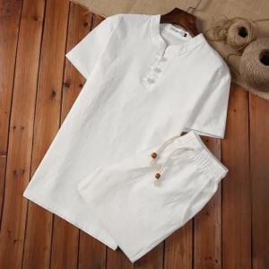White cotton linen Tang suit two-piece set with frog buttons and wooden bead drawstring, overhead view