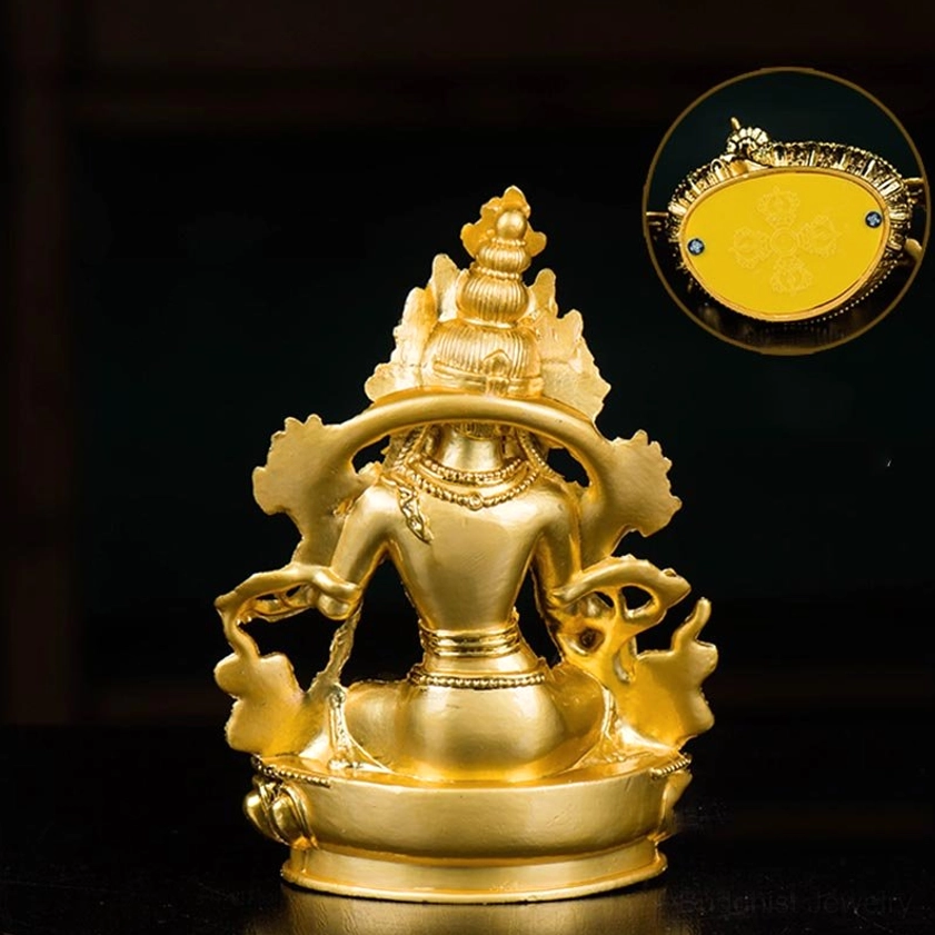 White Tara statue back view on black background with detailed gold engraved base and flat mounting surface