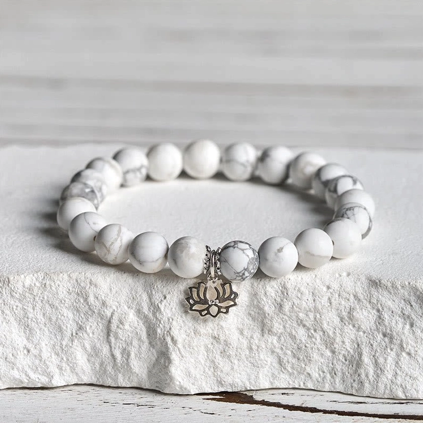 White turquoise lotus sterling silver bracelet with 8mm beads featuring polished gemstones and intricate silver lotus charm
