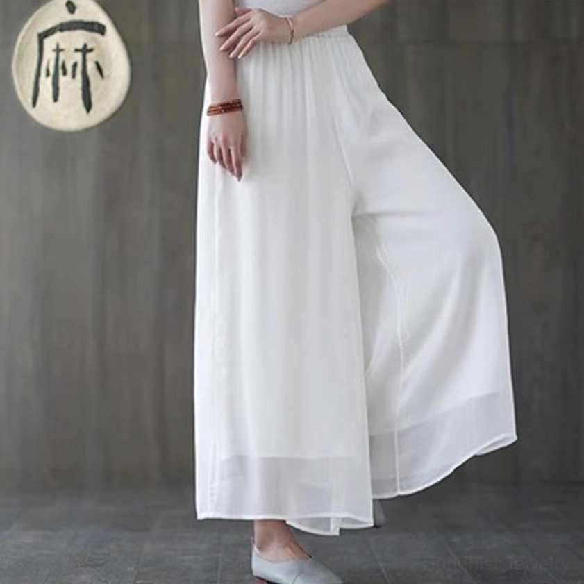 White wide-leg meditation pants with elastic waistband and comfortable fit designed for tai chi, qigong and yoga practice