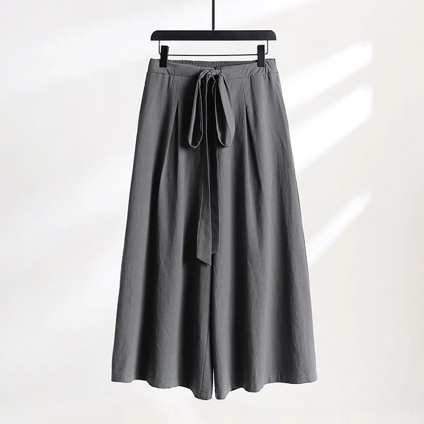 White wide-leg meditation pants with tie waist and ankle-length cut front view