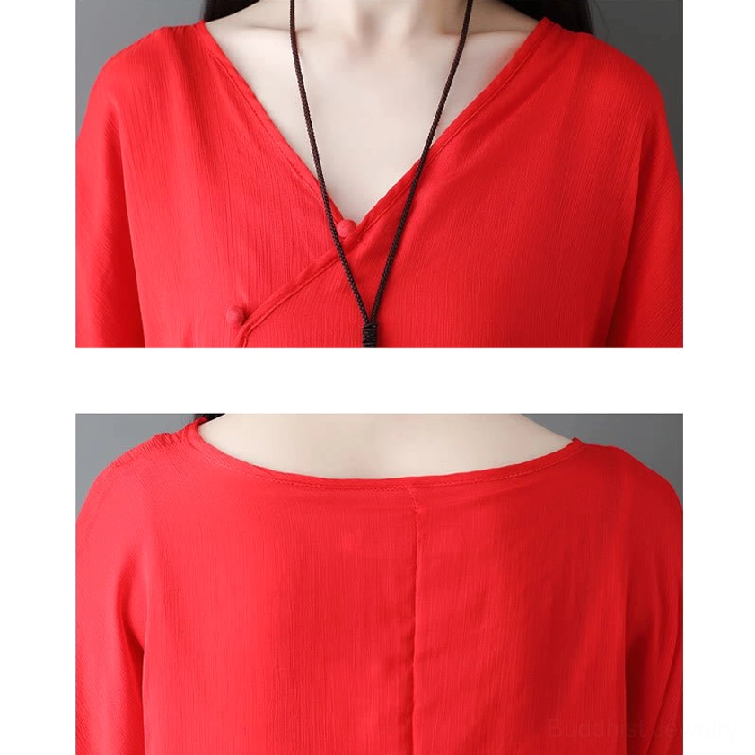 White Zen meditation tunic and pants side angle showing V-neckline and comfortable non-stretch fabric construction