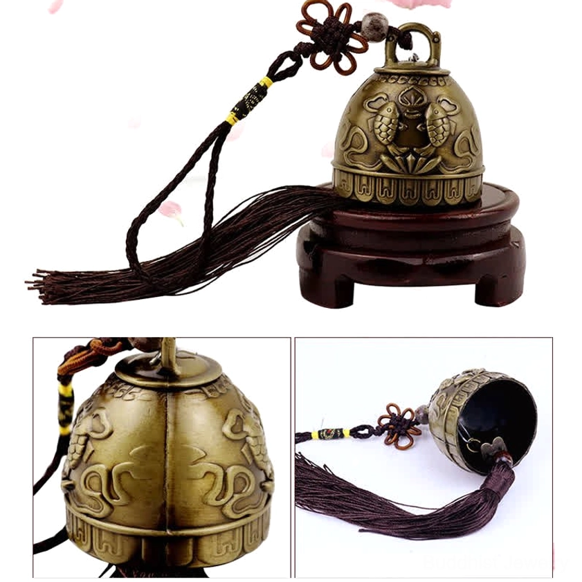 Wind chime with hanging tassel showing bronze metal build and handcrafted construction detail