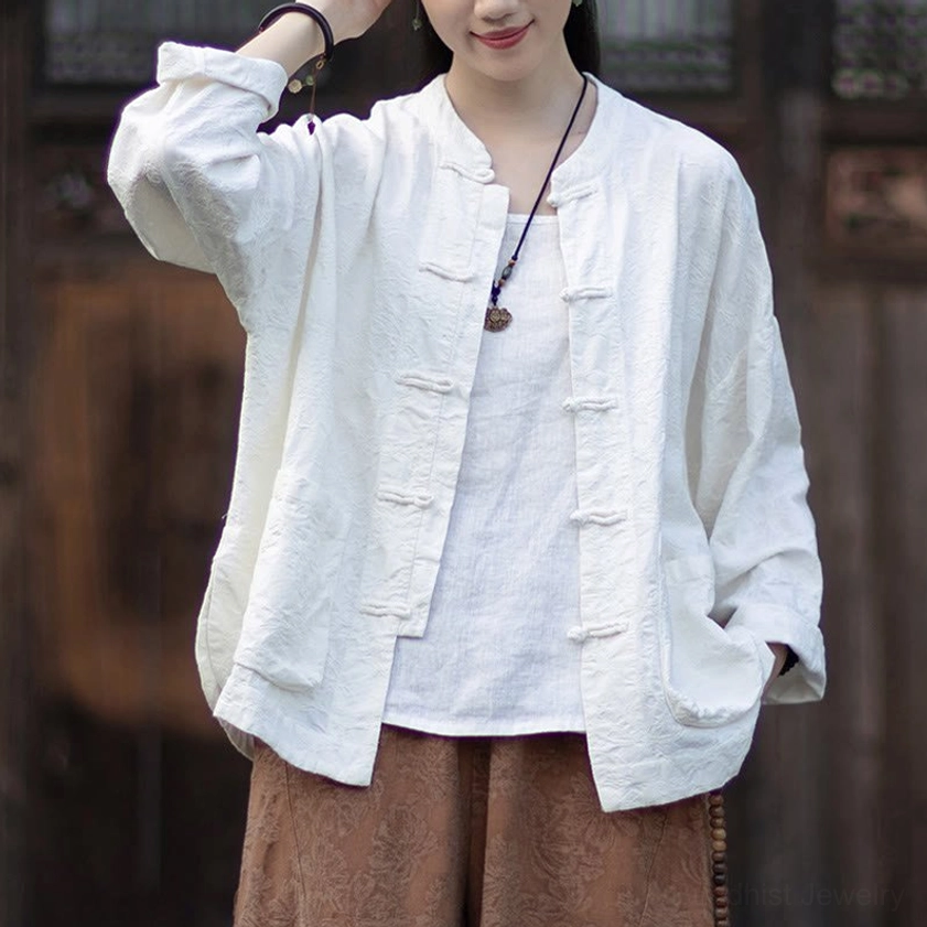 Women's white jacquard meditation shirt with frog buttons and stand collar in zen aesthetic
