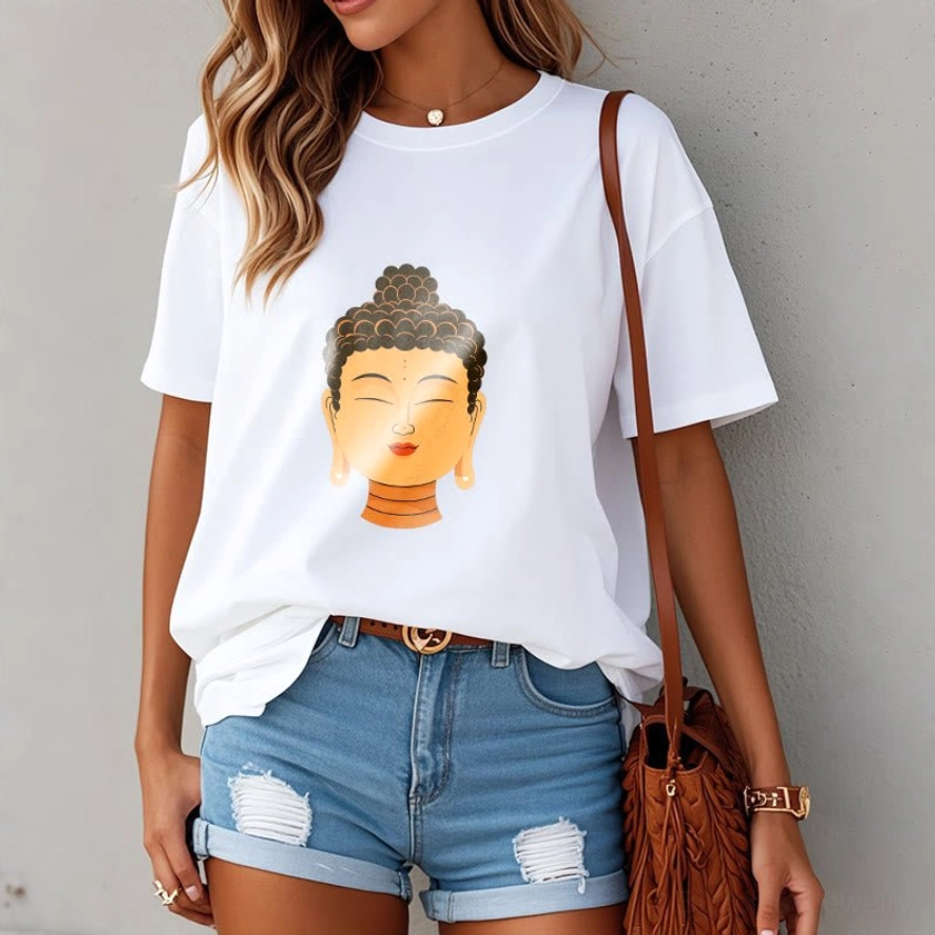 Women wearing white Buddha meditation t-shirt with denim shorts casual everyday style