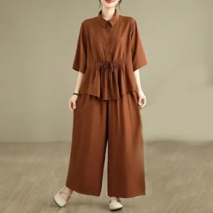 Women's Buddhist meditation clothing set in Sienna color - full-body front view showing short-sleeve stand collar top and wide-leg pants