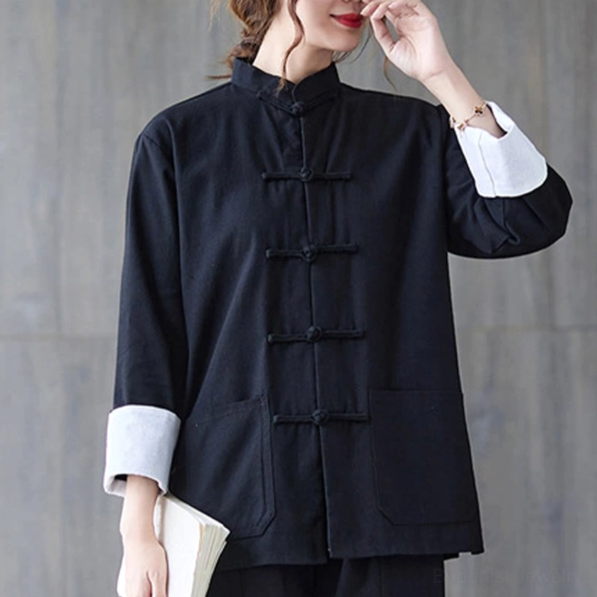 Women's black frog-button cotton linen shirt with white contrast cuffs and traditional toggle closures