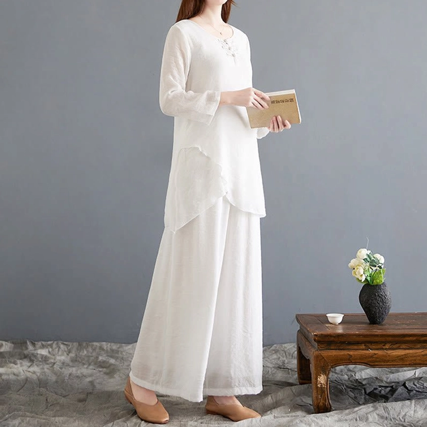 Right front view of women's linen meditation ensemble with asymmetrical hem design and floor-length wide pants - authentic Buddhist-inspired spiritual wear