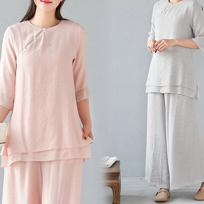 Standing front pose of model in white meditation cotton linen two-piece set showing complete outfit styling and proportions