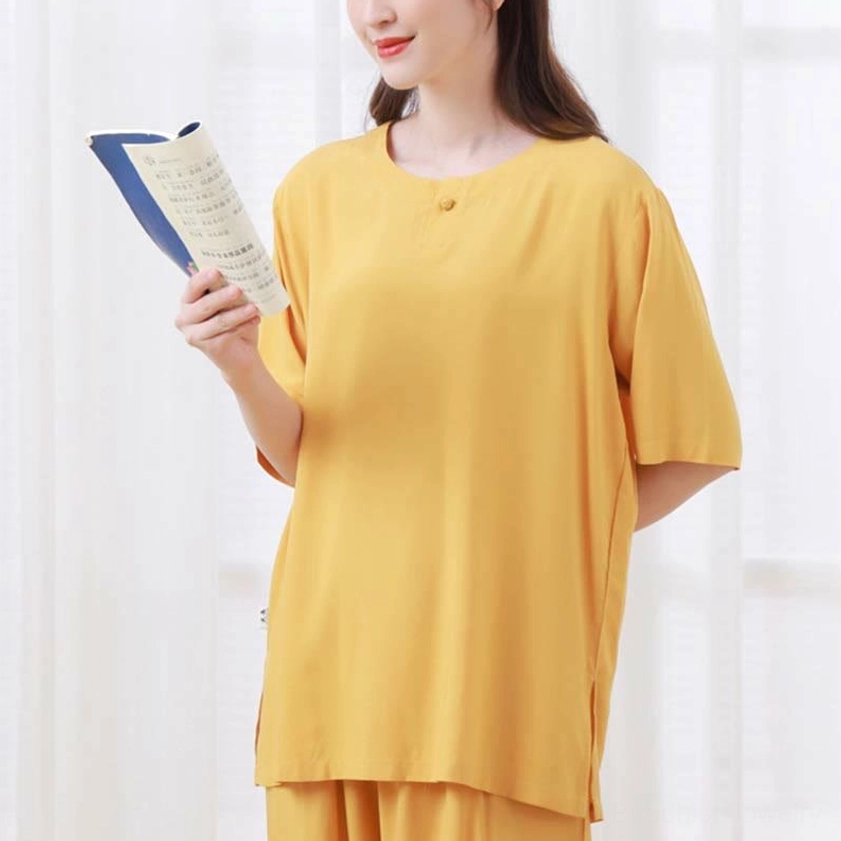 Navy meditation practice outfit featuring loose fit crew neck top and elastic waist pants for comfortable spiritual practice