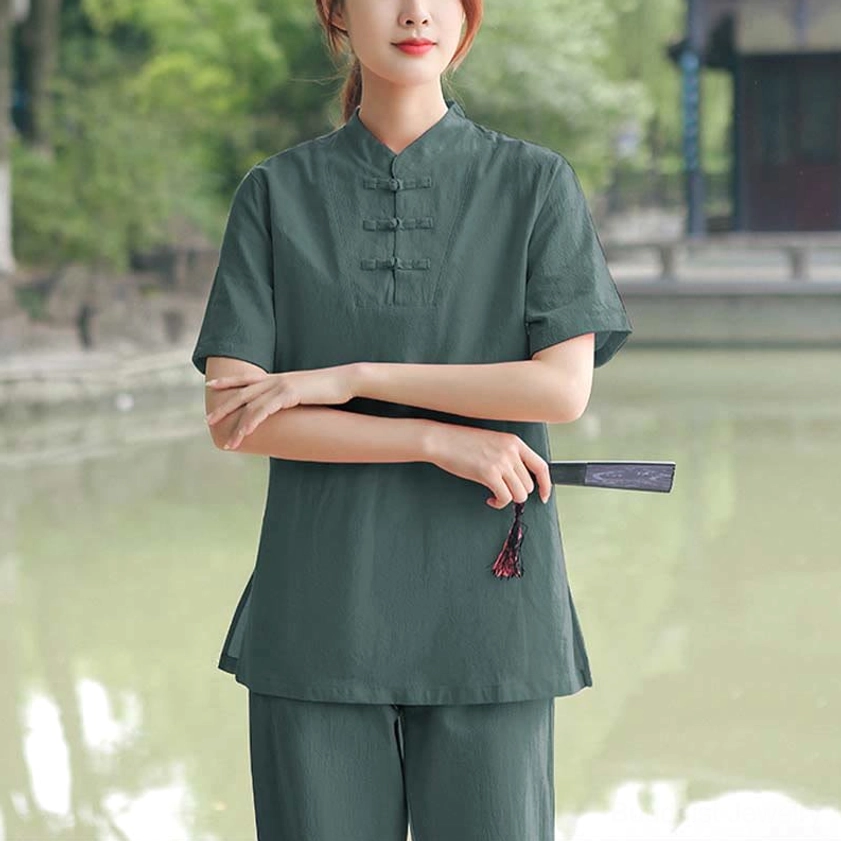 Women's meditation yoga and tai chi set with short sleeves demonstrating breathable fabric for year-round practice