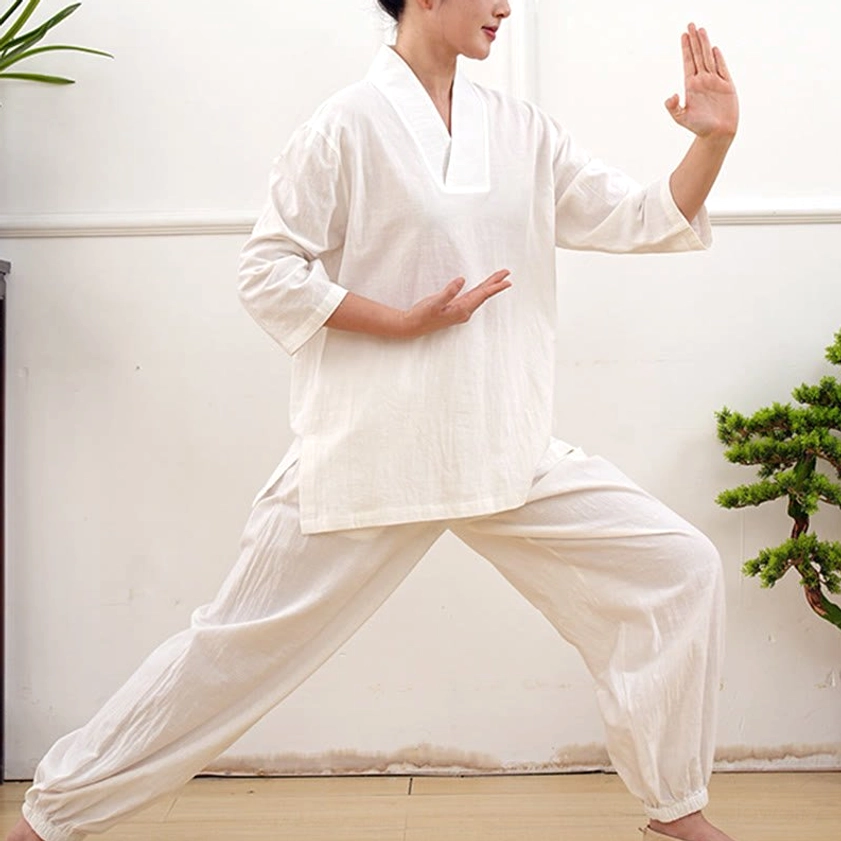 Back view of navy blue cotton tai chi meditation women's clothing showing simple traditional design