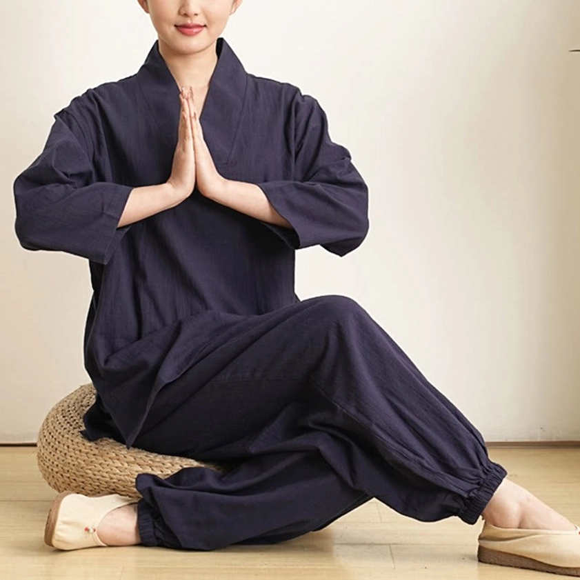 White meditation and tai chi women's clothing set laying flat showing full silhouette