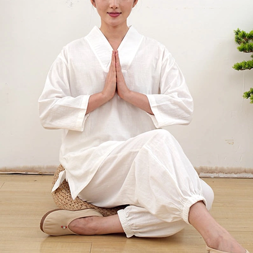 White women's meditation clothing set detail showing elastic waist and cuffed ankle design
