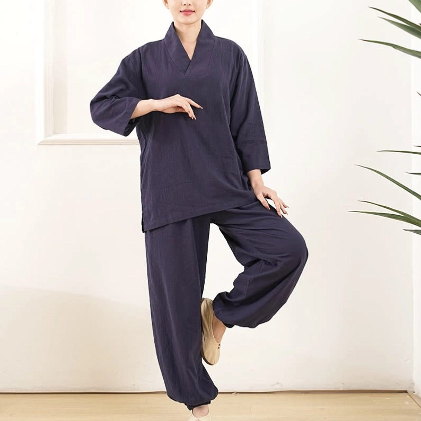 Women in white cotton meditation clothing demonstrating relaxed comfortable fit for yoga practice