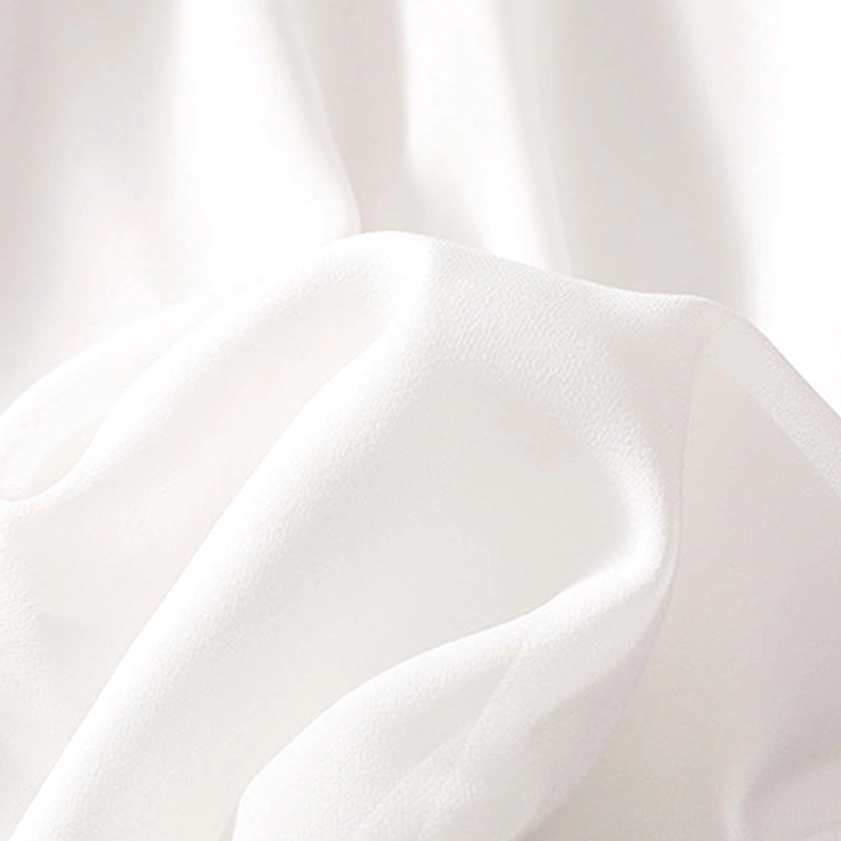 Product packaging and presentation of women's handcrafted meditation uniform set with tunic top and wide leg pants