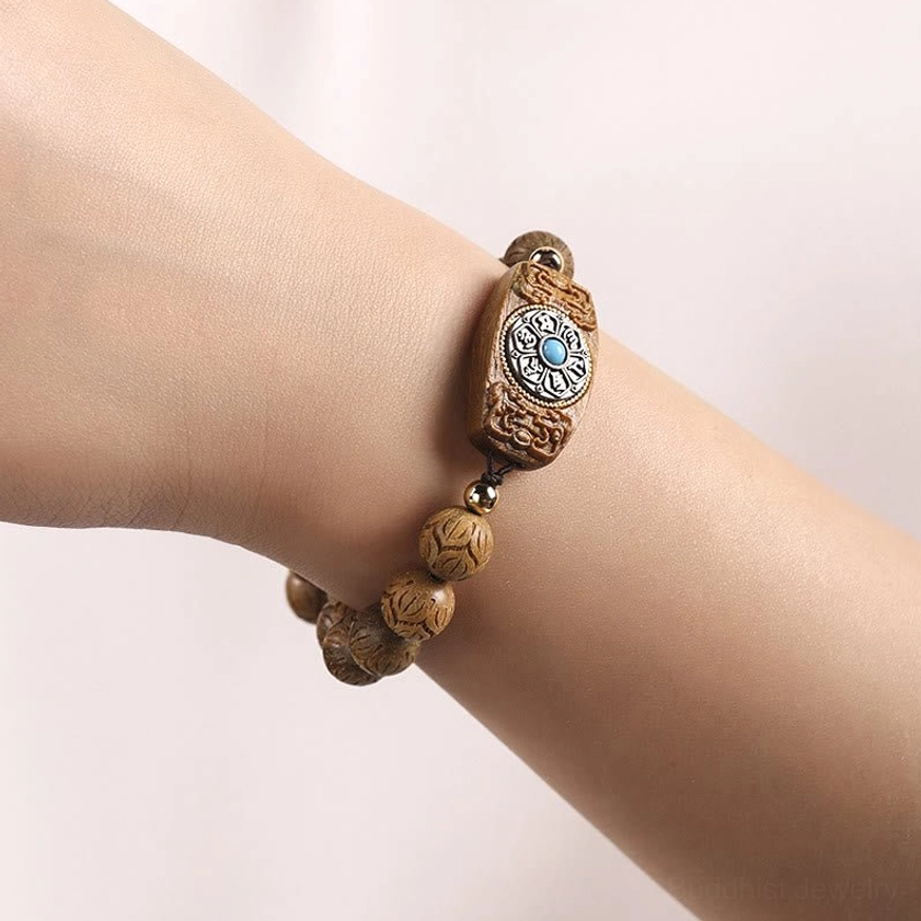 Sacred wooden bracelet wrist wear demonstration showing fit and comfort on wrist