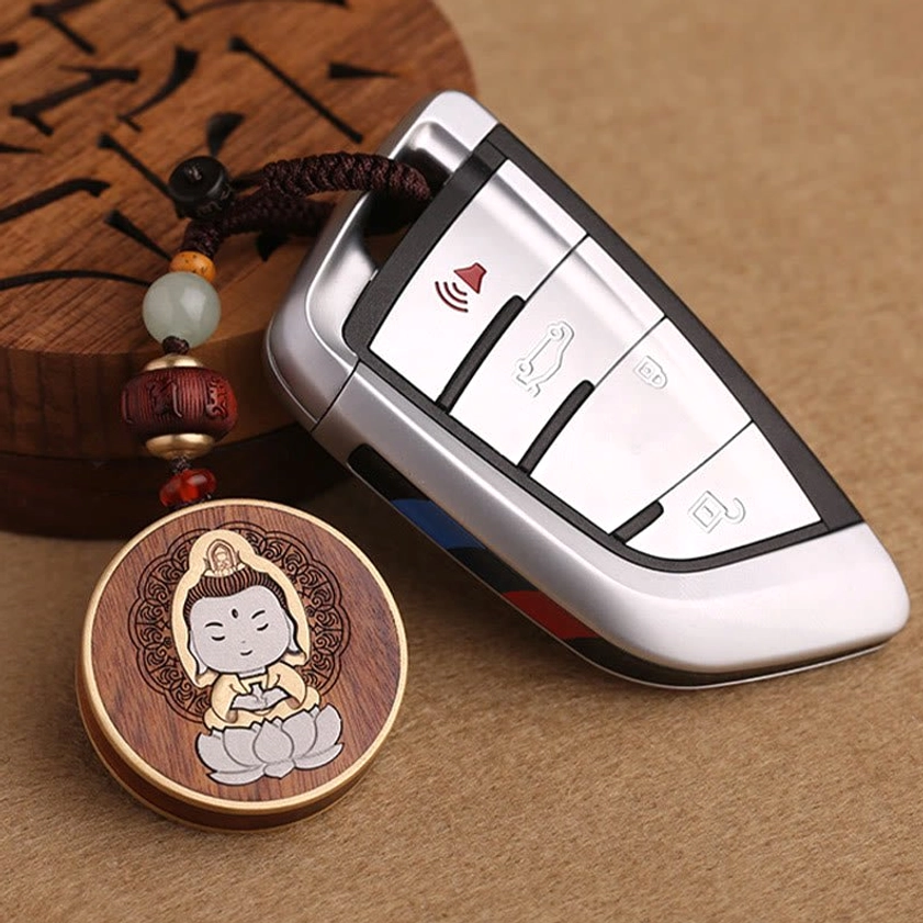 Wooden Buddhist keychain with gold-plated copper accents and premium finishing