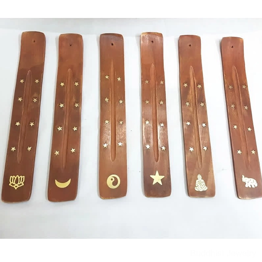 Wooden incense holder tray set top down view six unique decorative motif variations
