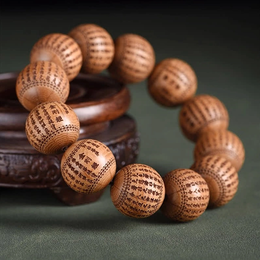 Abelia Biflora wood Buddhist mantra bracelet showing natural wood grain and protective properties