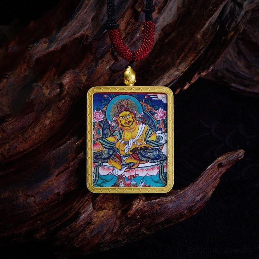 Yellow God of Wealth Buddhist Thangka pendant with prosperity deity artwork and gold metal frame