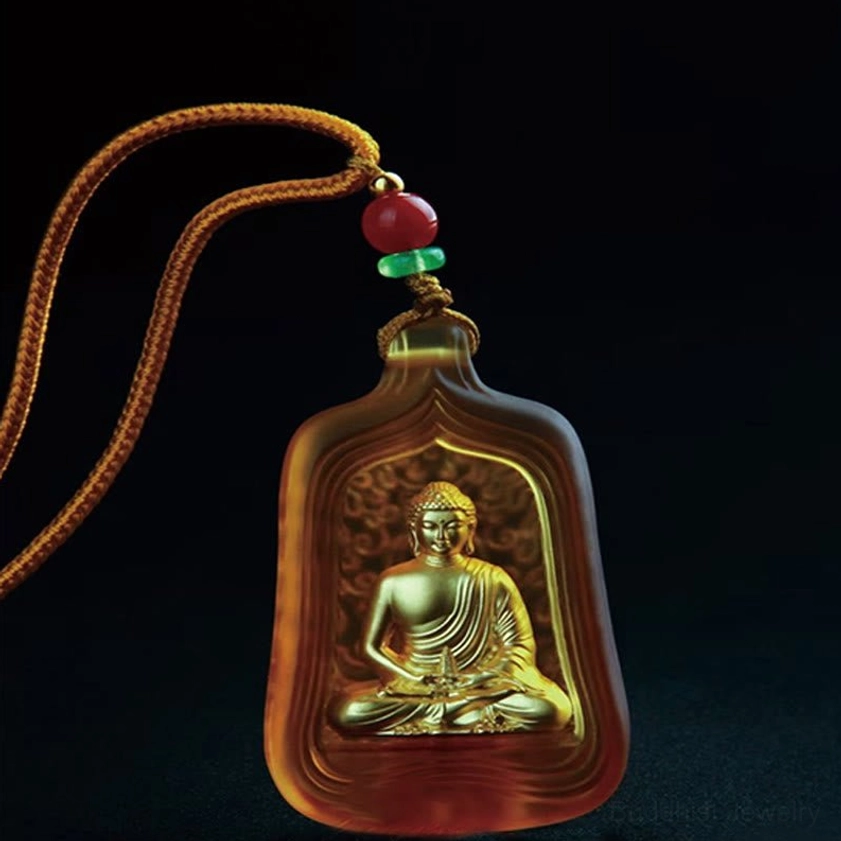 Medicine Buddha pendant necklace in yellow Liuli crystal glass with braided cord and decorative metal hardware