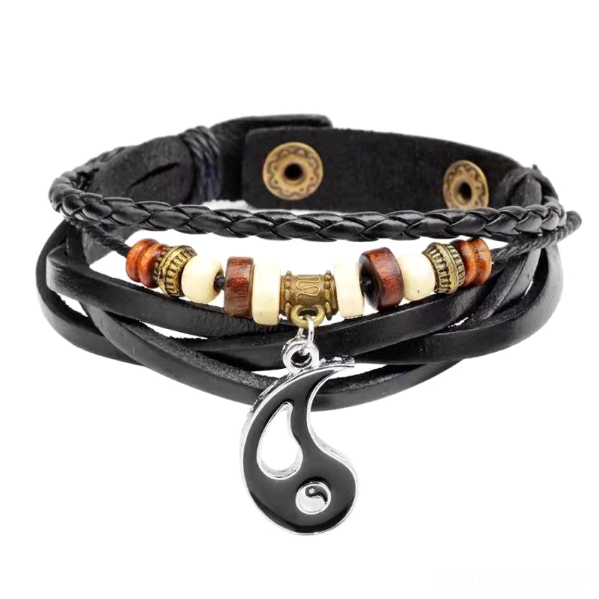 Black yin yang pendant leather bracelet with braided cowhide, brown and white decorative beads, teardrop charm close-up