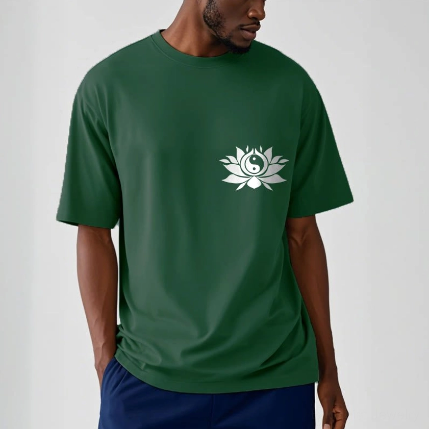 Male model dark green yin yang lotus tee navy pants studio background crew neck