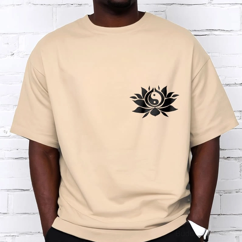 Male model wearing light pink yin yang lotus spiritual tee casual outfit