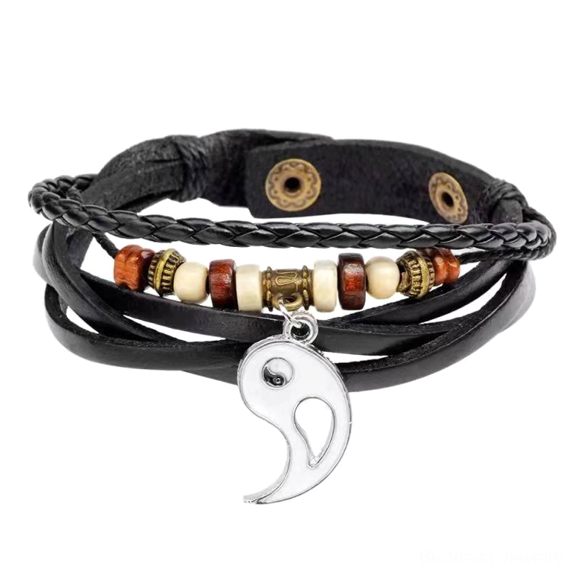 White yin yang balance bracelet with large silver half-charm, multi-layer cowhide straps, and mixed decorative bead accents