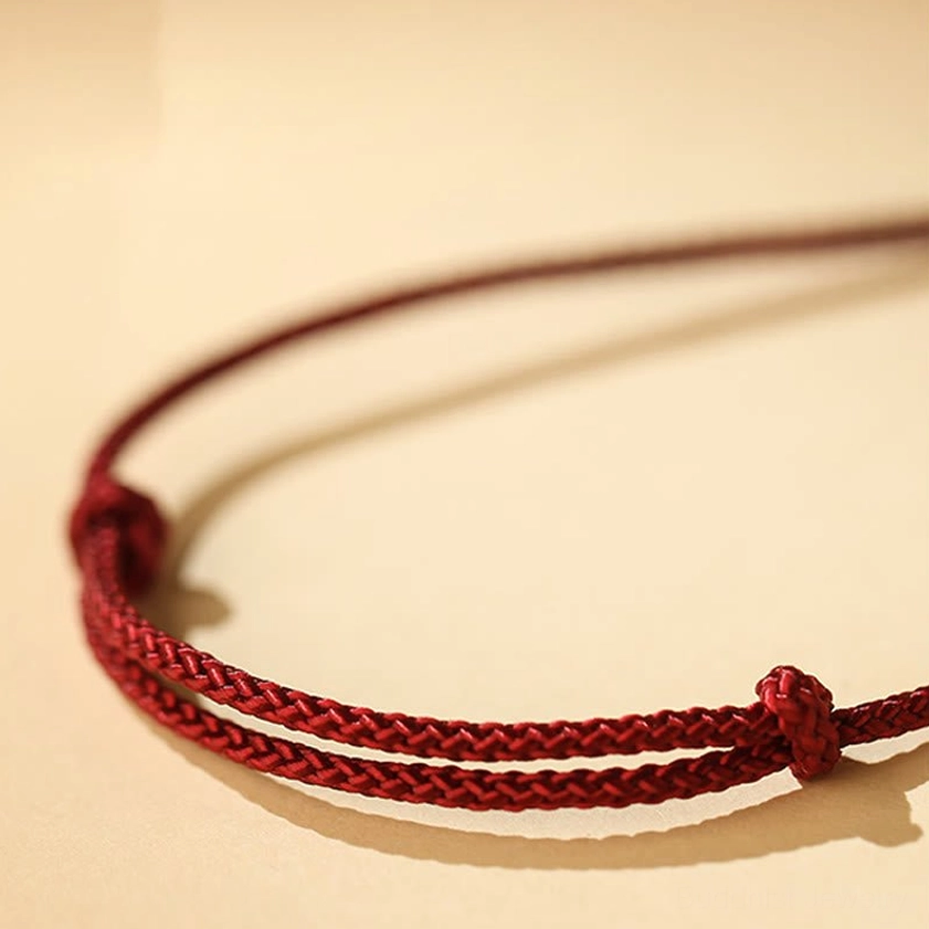 Adjustable braided red rope cord for Zakiram necklace with knotted closure detail