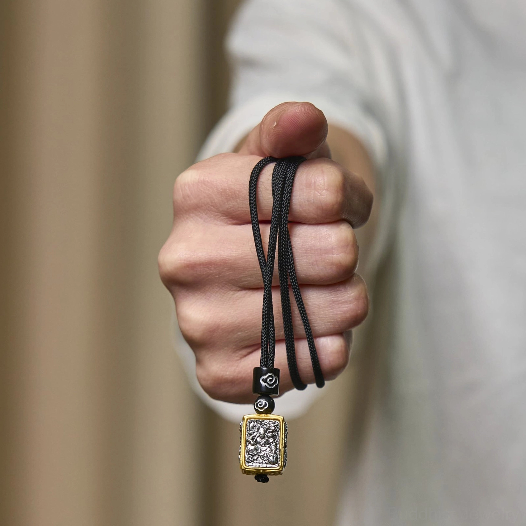Buddhist Zakiram protection necklace showcasing traditional craftsmanship and spiritual symbolism