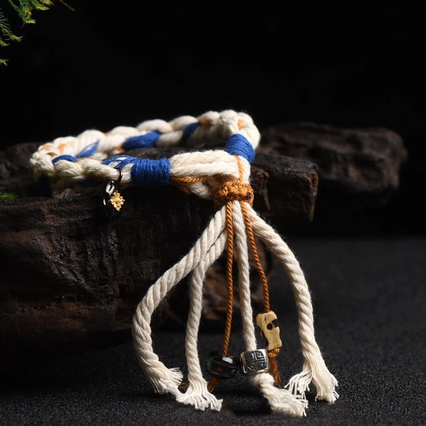 Premium handcrafted Zakiram bracelet showing authentic Buddhist string work and traditional woven technique for prosperity blessing