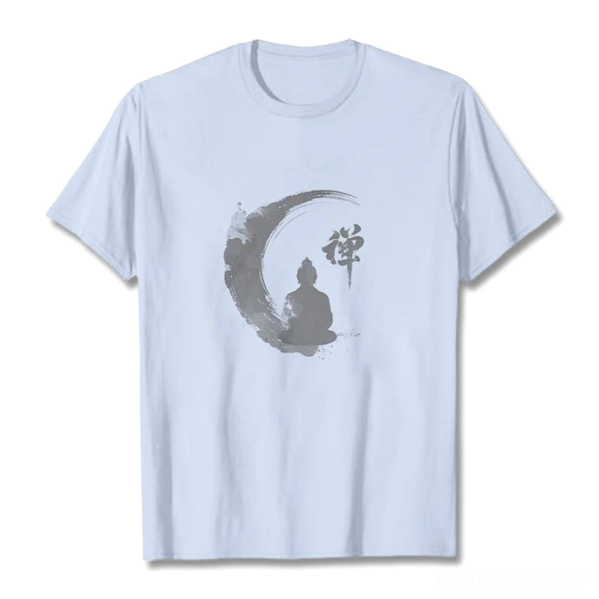 Light cyan Zen Buddha meditation t-shirt flat lay front view showing the soft cotton fabric and grey ink-wash Buddhist crescent moon design