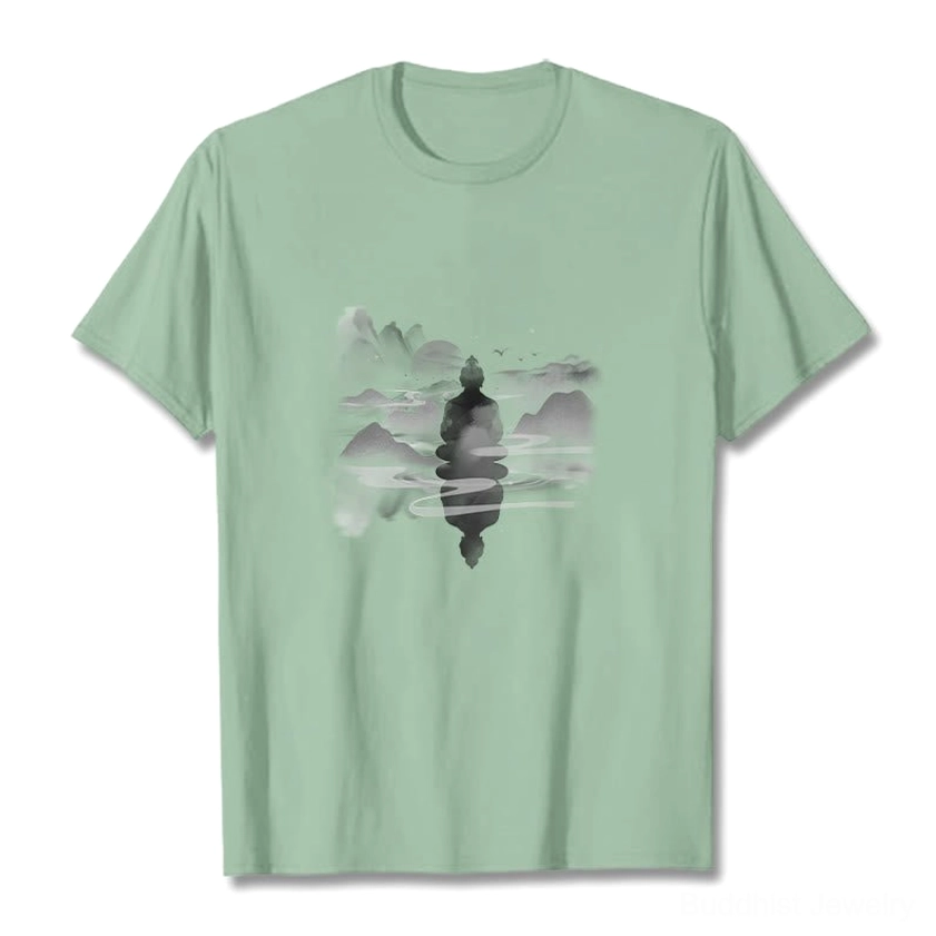 Grey Buddhist spiritual t-shirt with serene meditative Buddha landscape design flat lay