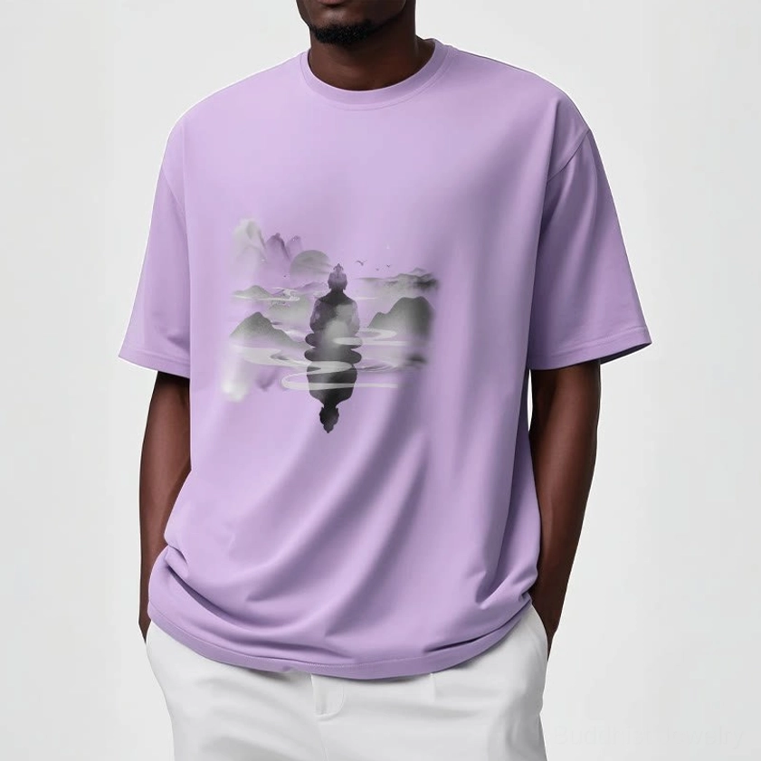 Light cyan Buddhist meditation t-shirt front display with misty mountain Buddha graphic