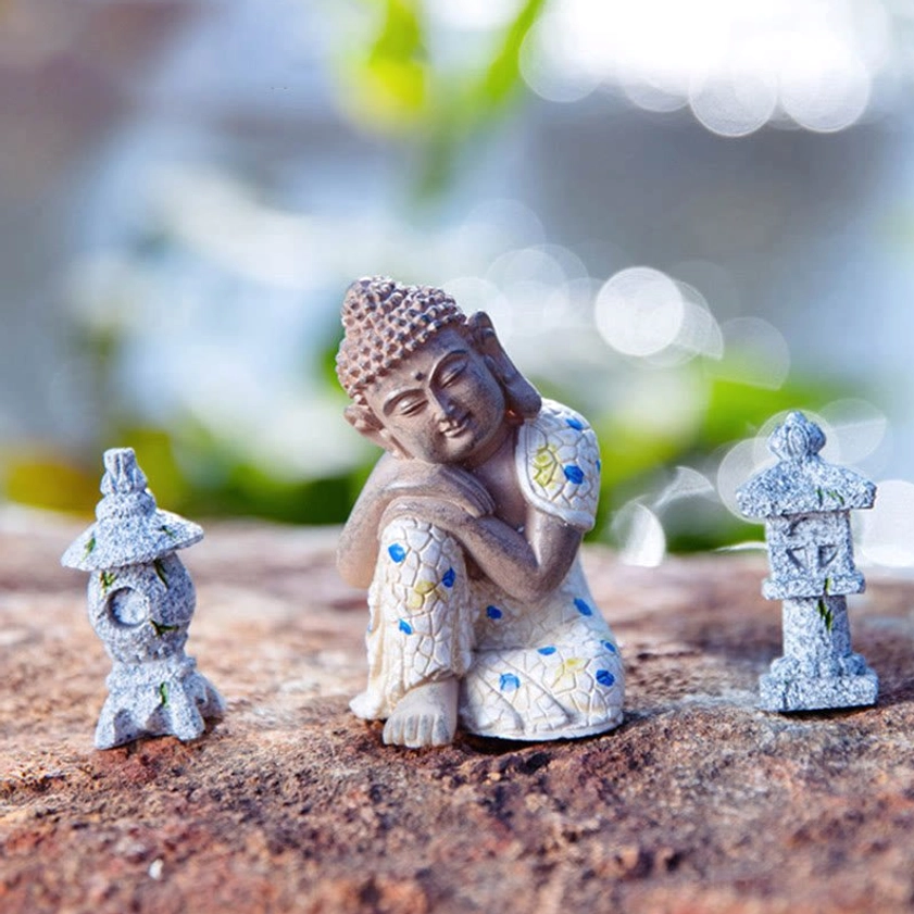 Resting zen Buddha statue with matching stone pagoda lanterns, complete Buddha meditation set for home altar