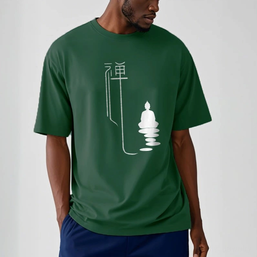 Zen buddha tee dark green color worn by male model with white graphic design and navy bottoms