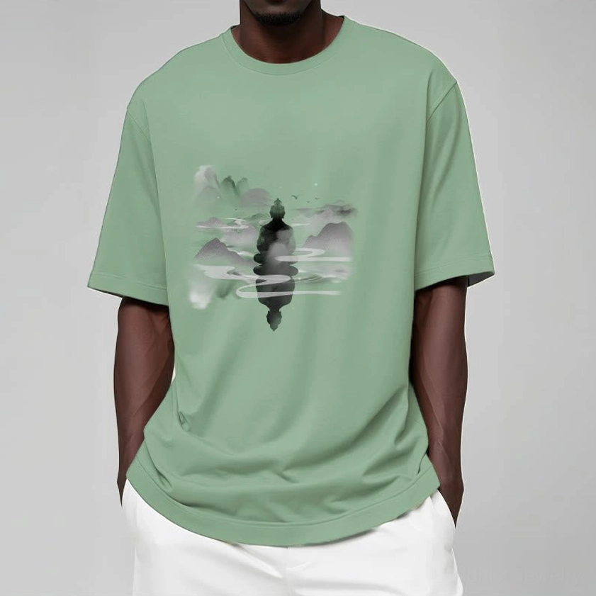 Male model wearing light cyan Zen Buddhist t-shirt with mountain meditation artwork casual