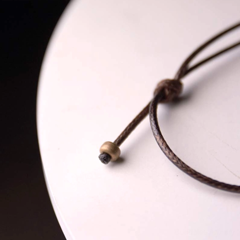 Ebony wood Zen circle Buddhist pendant artist craftsmanship and handmade detail