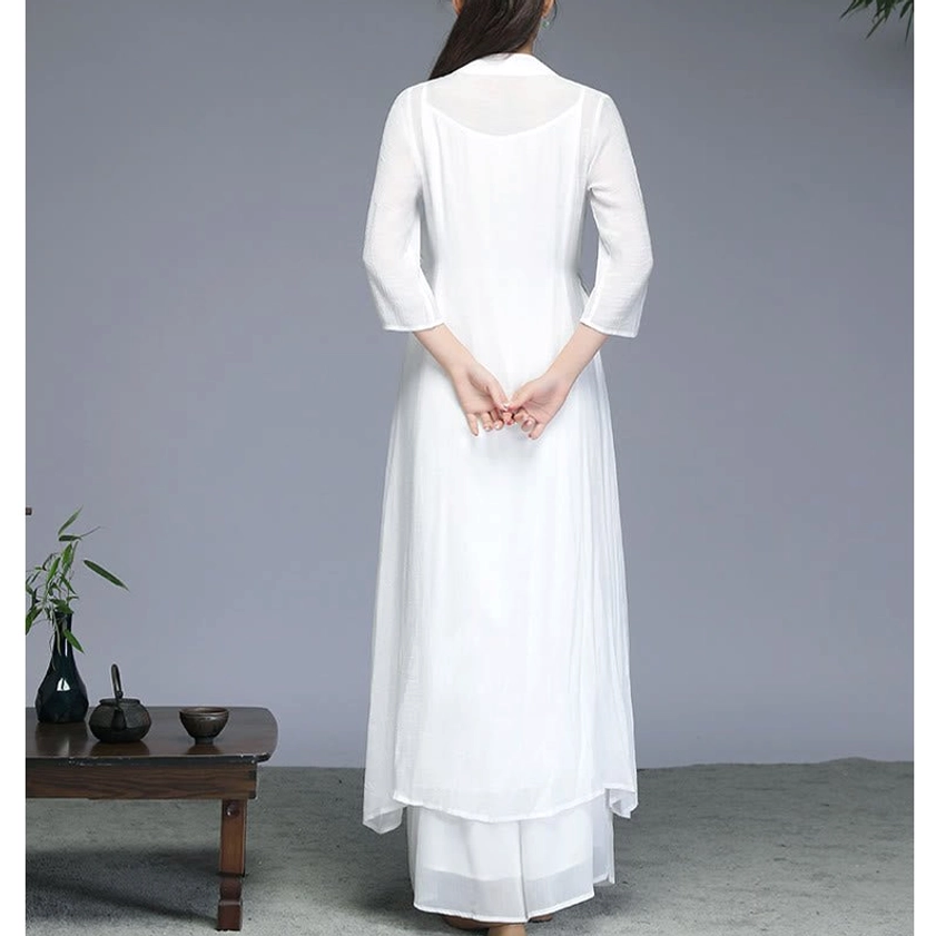 Back view of white Zen meditation dress showing simple elegant design and double-layer fabric construction for spiritual practice