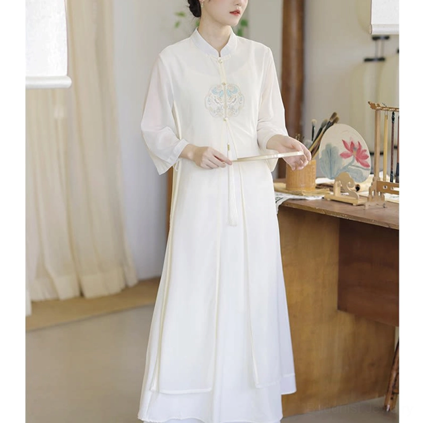 Off-white Zen style meditation dress set with embroidered details, right front full view showing flowing silhouette and comfortable fit