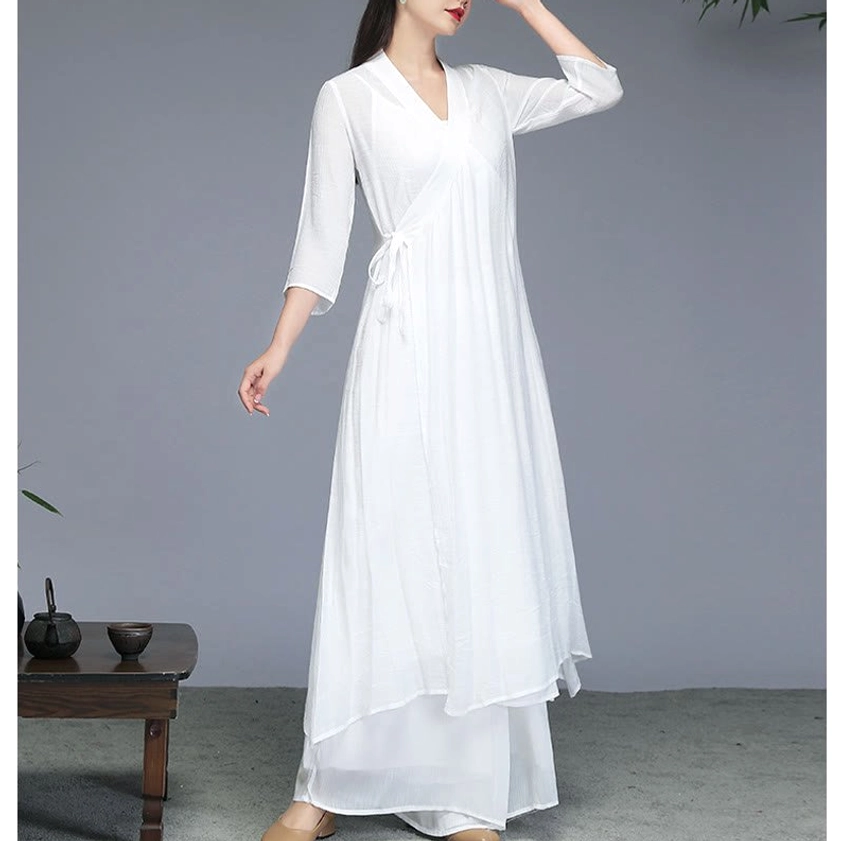 White Zen meditation chiffon dress side view displaying flowing fabric and elegant silhouette for yoga and mindfulness practice