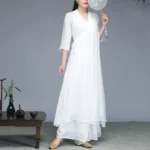 White Zen meditation chiffon midi dress with V-neck and 3/4 sleeves, front view with side tie detail for yoga and spiritual practice