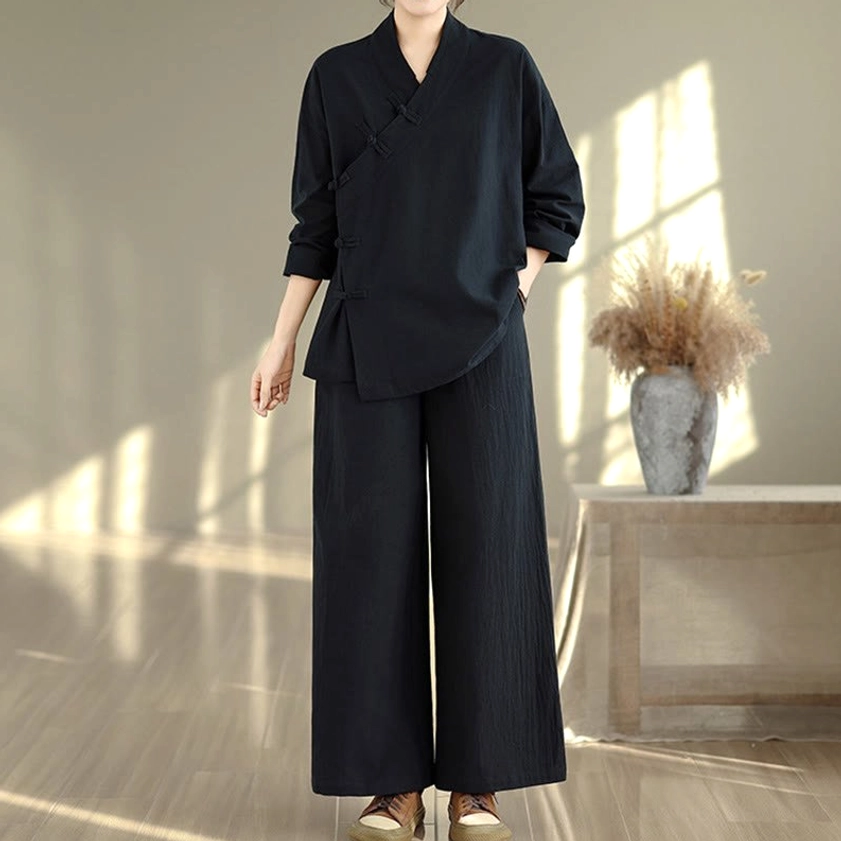 Black zen meditation yoga uniform full body back view showing plain back design and wide-leg pants